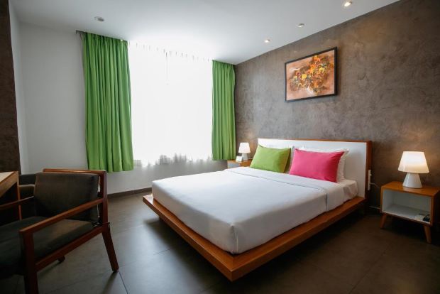 Phòng ngủ giường đơn Khách sạn ÊMM Sài Gòn